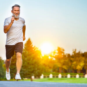 san diego naturopathic doctors elder man running on road in sun shine