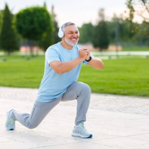 san diego naturopathic doctors elder man stretching walking lunge squat at park