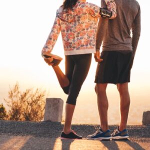 san diego naturopathic doctors man and woman standing and resting on road after exercise