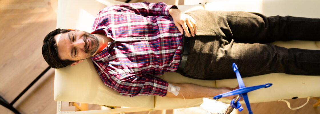 san diego naturopathic doctors man laying down with iv drip top view