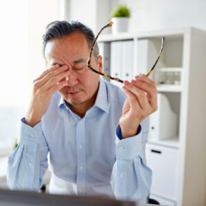 san diego naturopathic doctors older man sitting with hand over tired face