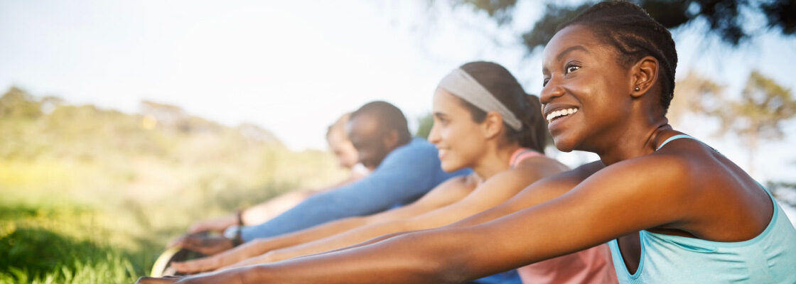 san diego naturopathic doctors group of people stretching legs in sunny park