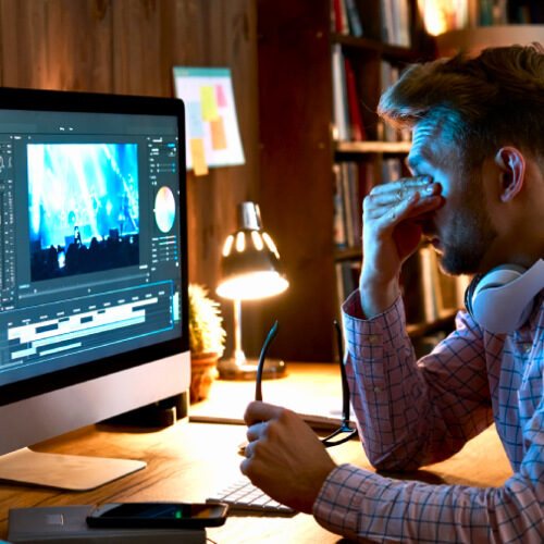 san diego naturopathic doctors man clutching tired eyes in front computer