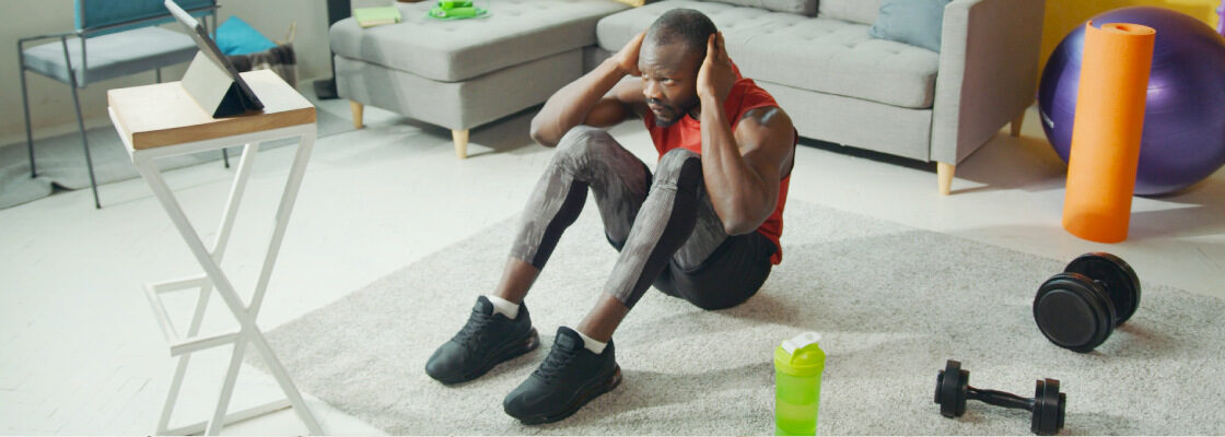 san diego naturopathic doctors man performing crunches at home gym