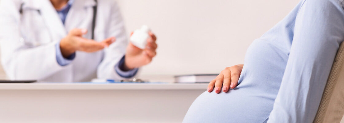 san diego naturopathic doctors pregnant woman at doctors office hand on belly