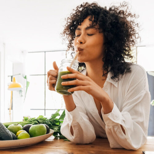 san diego naturopathic doctors woman enjoying drinking green smoothy